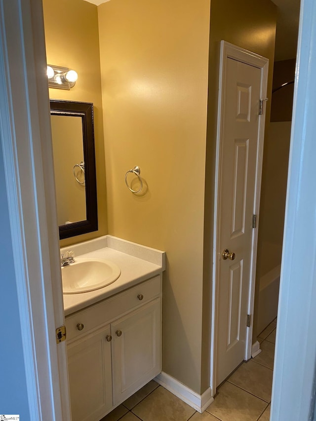 bathroom featuring tile patterned floors and vanity