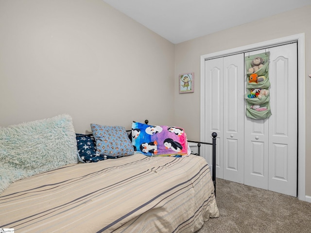 carpeted bedroom with a closet