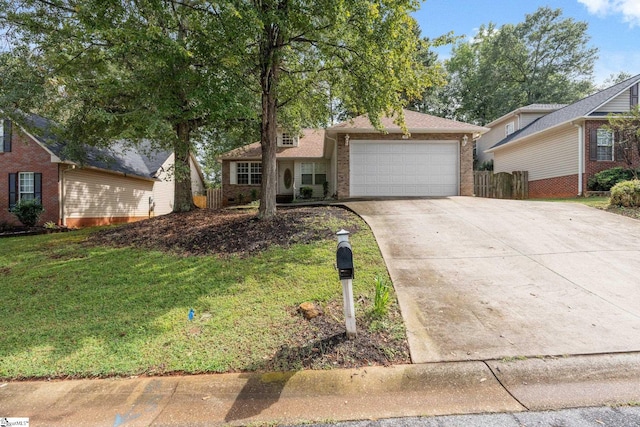 ranch-style home featuring a front yard and a garage