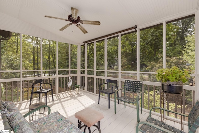 sunroom / solarium with a wealth of natural light and ceiling fan