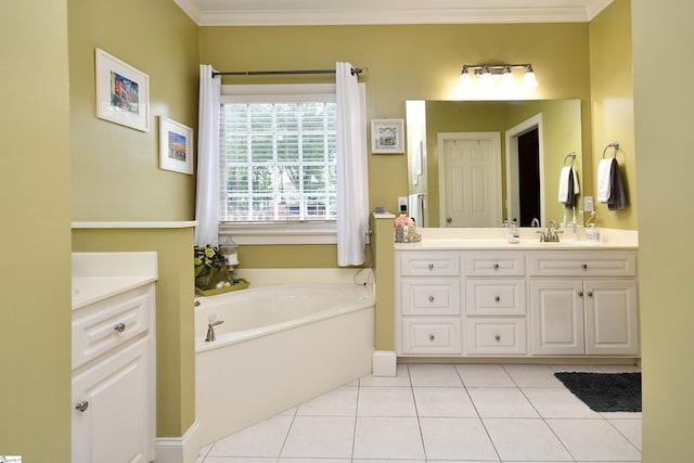 bathroom with ornamental molding, tile patterned flooring, a washtub, and vanity