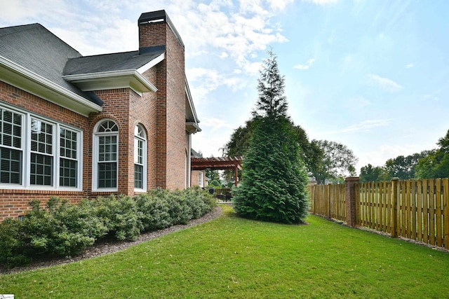 view of yard with a pergola