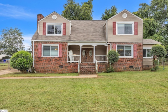 view of front facade with a front lawn and a porch