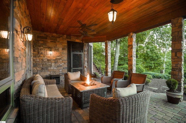 view of patio / terrace with an outdoor living space and ceiling fan