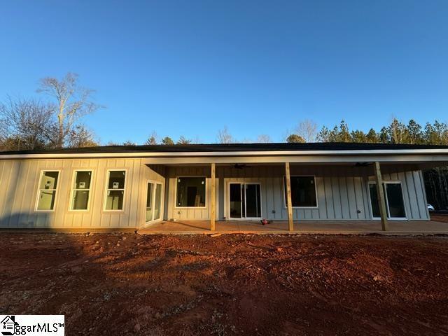 back of property featuring a patio area