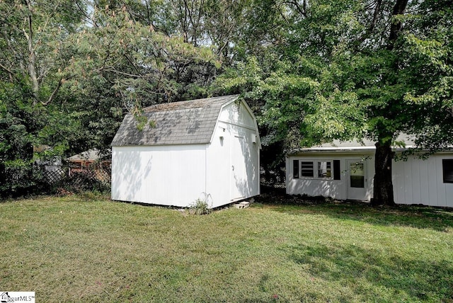 view of outdoor structure with a yard