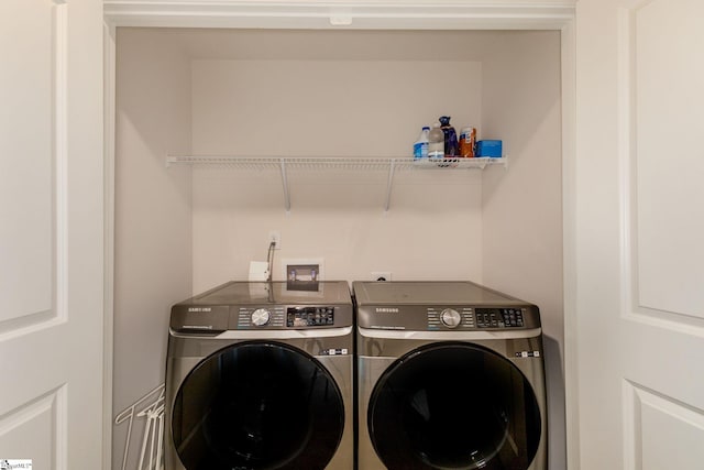 laundry room featuring washer and dryer