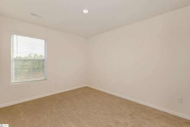 empty room featuring carpet