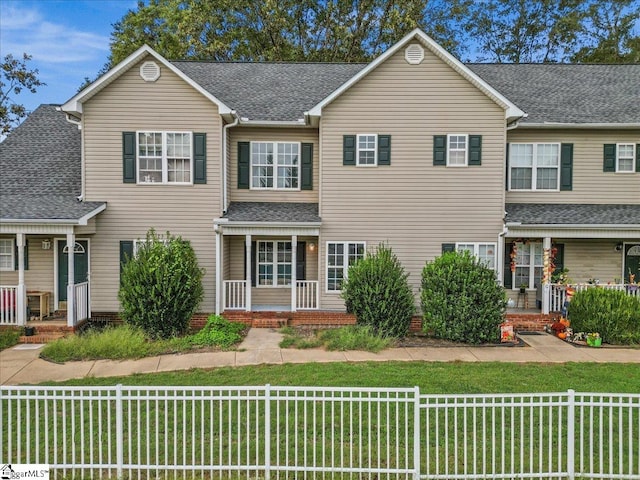 view of front of home with a front lawn