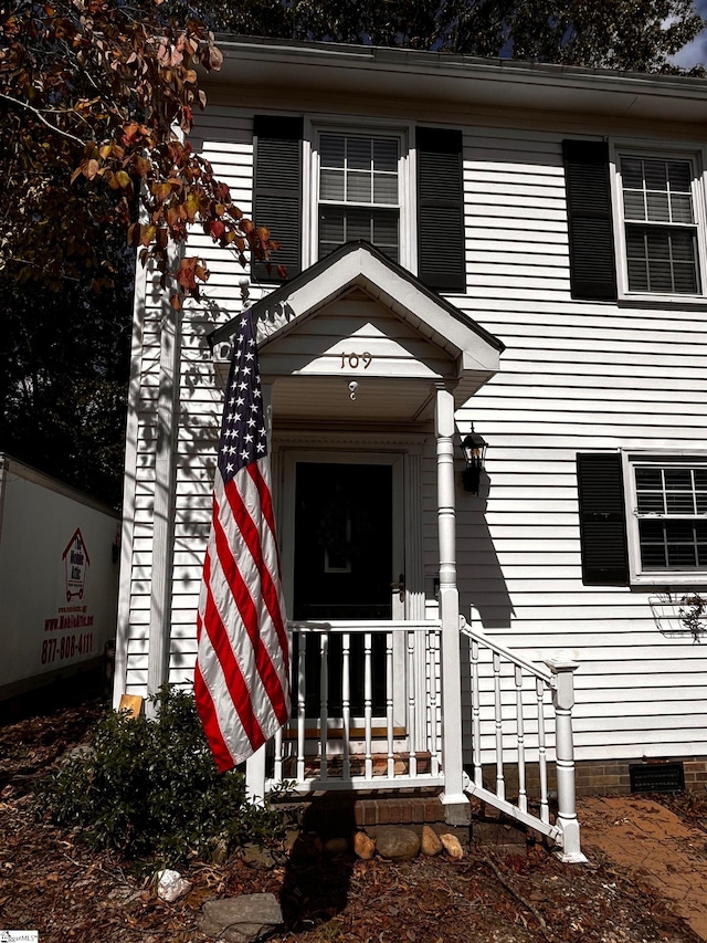 property entrance with a porch