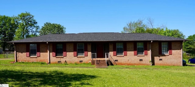 ranch-style house featuring a front lawn