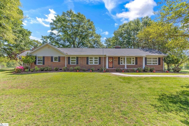 ranch-style house with a front lawn