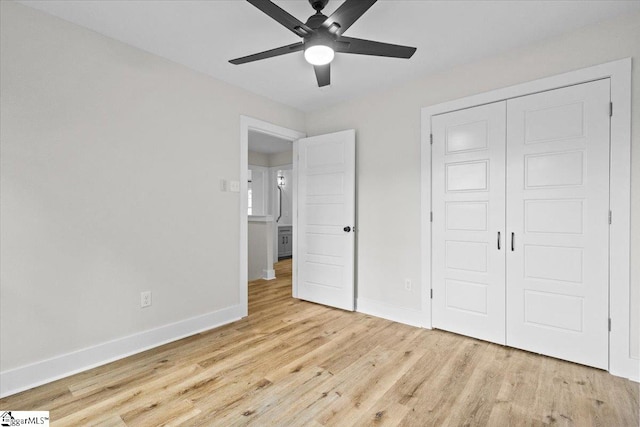 unfurnished bedroom with a closet, light wood-type flooring, and ceiling fan