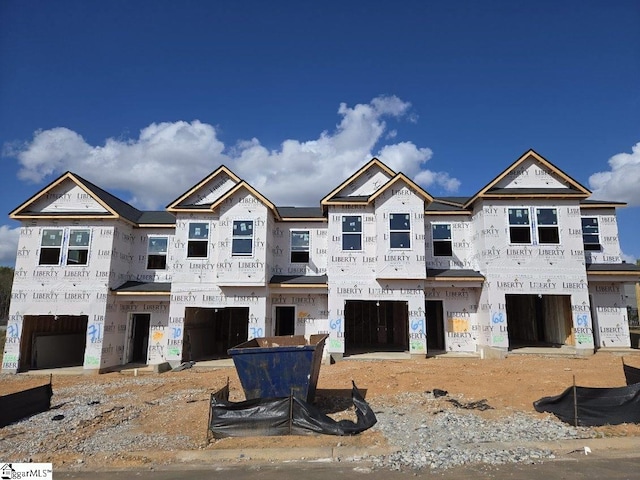 property in mid-construction featuring an attached garage