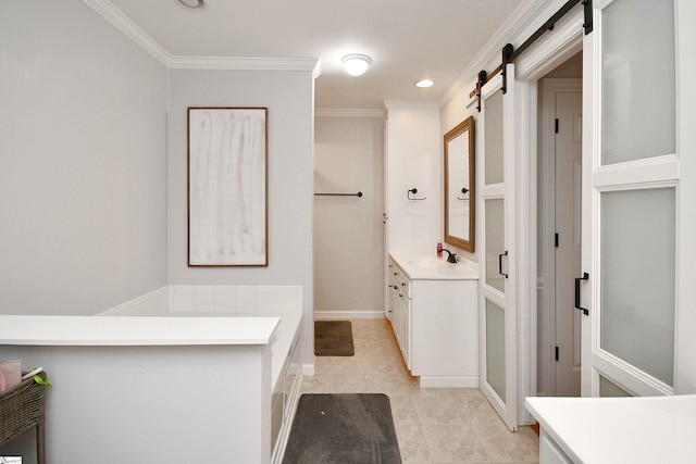 bathroom with ornamental molding, tile patterned flooring, vanity, and a washtub