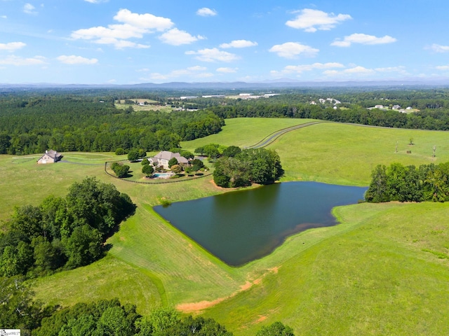 aerial view featuring a rural view and a water view