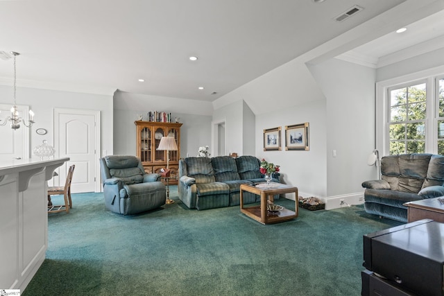 living room featuring carpet floors, ornamental molding, and a chandelier