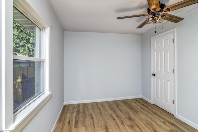 unfurnished room featuring ceiling fan and light wood-type flooring