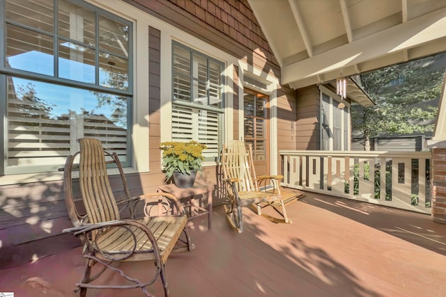 view of patio featuring a porch