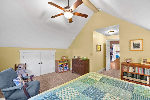 bedroom with lofted ceiling with beams, ceiling fan, light carpet, and a closet