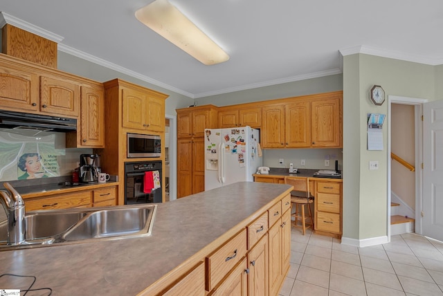 kitchen featuring ornamental molding, under cabinet range hood, a sink, light tile patterned floors, and black appliances
