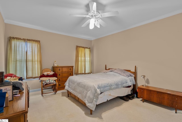 bedroom featuring crown molding, multiple windows, light carpet, and a ceiling fan
