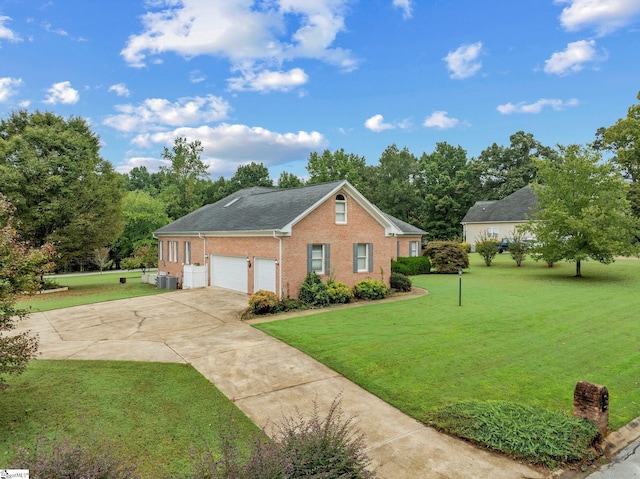 view of front facade with an attached garage, concrete driveway, a front yard, and brick siding