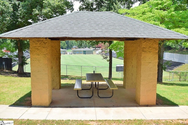 surrounding community featuring a lawn, a patio, and a gazebo