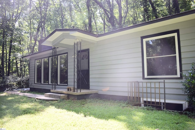 exterior space with a lawn