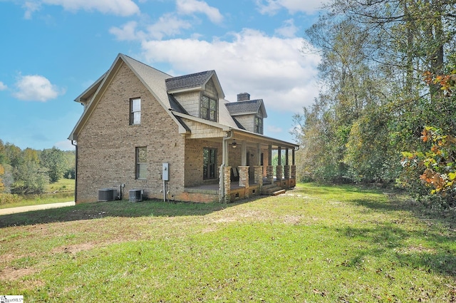 view of property exterior featuring a lawn and central air condition unit