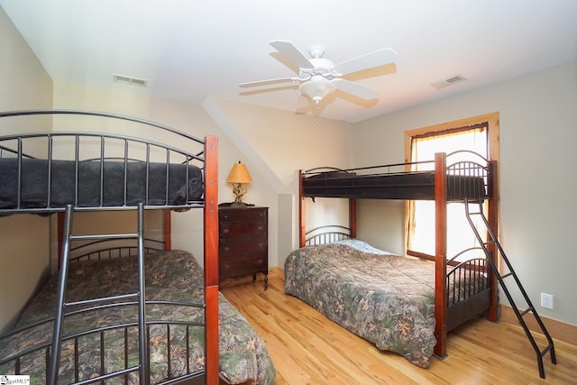 bedroom featuring wood-type flooring and ceiling fan