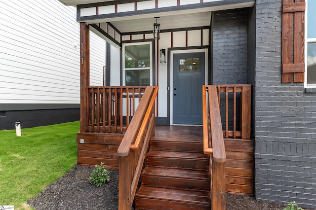 entrance to property with covered porch