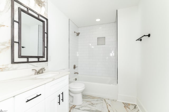 full bathroom with tiled shower / bath combo, vanity, and toilet