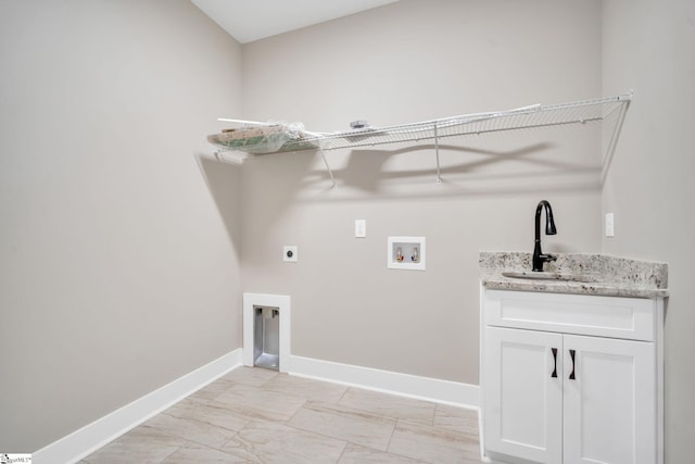 laundry room with hookup for a washing machine, hookup for an electric dryer, sink, and cabinets