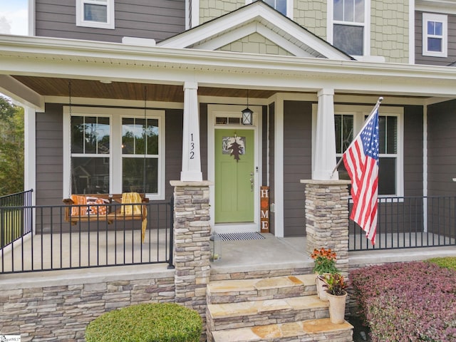 entrance to property with covered porch