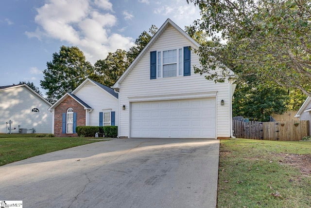 front facade featuring a garage and a front lawn