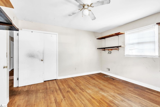 unfurnished room with ceiling fan and light hardwood / wood-style floors