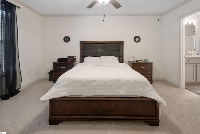 bedroom with light carpet, crown molding, connected bathroom, and ceiling fan