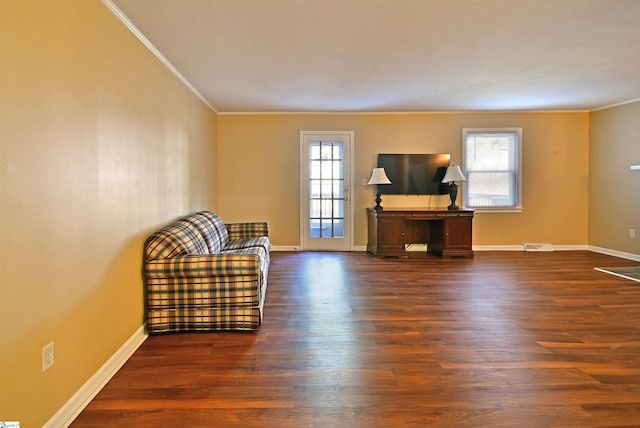 unfurnished room featuring crown molding and dark hardwood / wood-style flooring