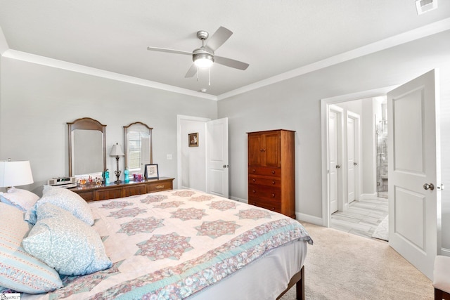 bedroom featuring ceiling fan, ensuite bath, light carpet, and ornamental molding