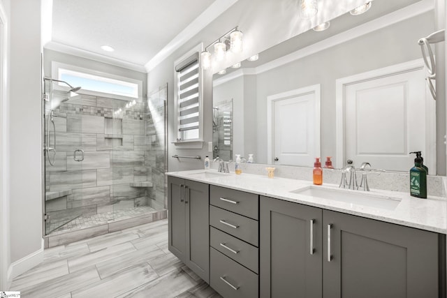 bathroom featuring ornamental molding, walk in shower, and vanity