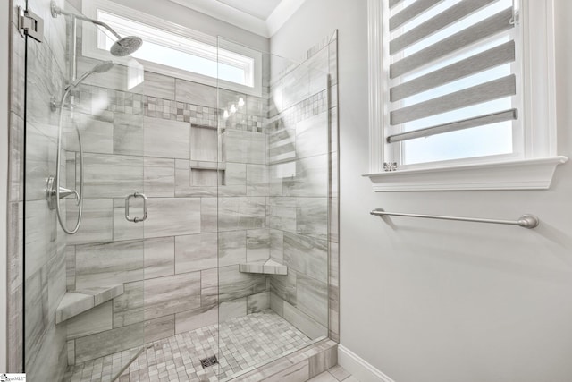 bathroom with an enclosed shower and radiator