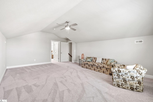 additional living space featuring lofted ceiling, ceiling fan, and light colored carpet