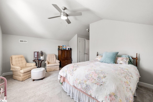 bedroom featuring lofted ceiling, carpet, and ceiling fan