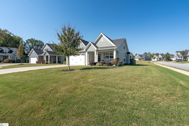 view of front facade with a garage and a front lawn