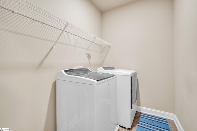 washroom featuring separate washer and dryer