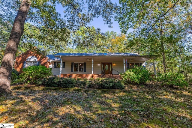 ranch-style home featuring covered porch