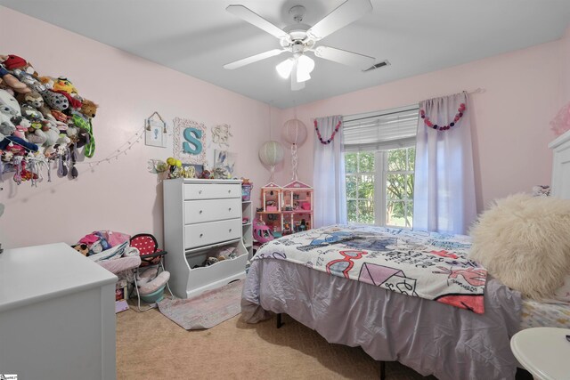 carpeted bedroom featuring ceiling fan