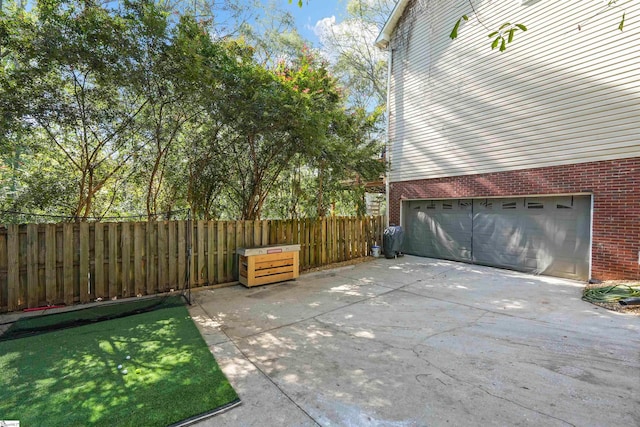 view of patio with a garage