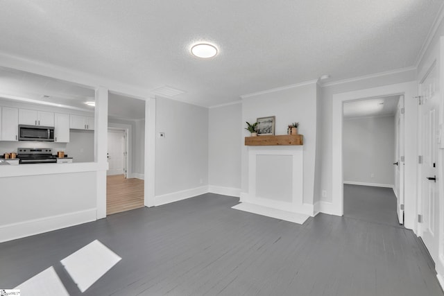 unfurnished living room featuring dark wood-type flooring, a textured ceiling, and crown molding